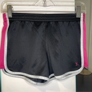 black and pink running shorts